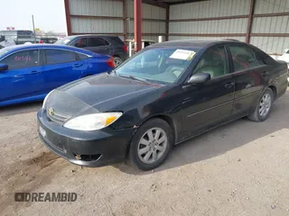 2003 Toyota Camry LE with VIN 4T1BE32K33U176270, listed as a IAAI auction lot 41995146 with 223,032 mi miles and . Bid and sale history available at DreamBid. Image 2.