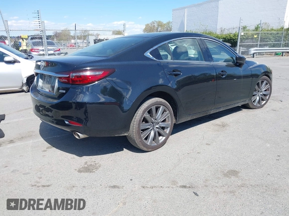 2018 Mazda Mazda6 Touring with VIN JM1GL1VM2J1308743, listed as a IAAI auction lot 41872947 with 125,236 mi miles. Bid and sale history available at carsss.com. Image 4.