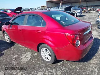 2013 Chevrolet Sonic LT with VIN 1G1JC5SH6D4247624, listed as a IAAI auction lot 41956996 with 144,392 mi miles and . Bid and sale history available at DreamBid. Image 3.