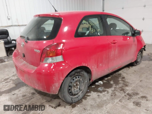 2009 Toyota Yaris with VIN JTDJT903695262292, listed as a IAAI auction lot 41636204 with 157,986 mi miles. Bid and sale history available at carsss.com. Image 4.
