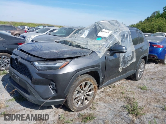 2022 Toyota RAV4 XLE Premium with VIN 2T3C1RFV5NC195230, listed as a IAAI auction lot 40495536 with 30,824 mi miles and . Bid and sale history available at DreamBid. Image 2.