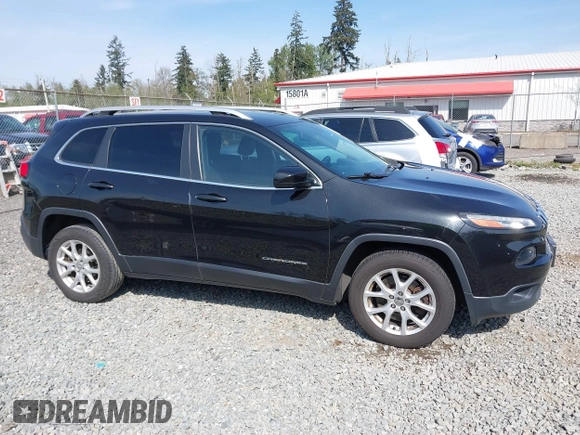 2016 Jeep Cherokee Altitude z VIN 1C4PJLCB5GW208005, wystawiony jako IAAI lot #42120987 z przebiegiem 179 423 mil mil oraz . Historia ofert i sprzedaży dostępna na DreamBid. Obrazek 13.