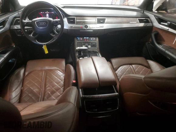 2015 Audi A8 4.0T z VIN WAUJ2AFD5FN009882, wystawiony jako Copart lot #84222704 z przebiegiem 56 118 mil mil oraz Czysty tytuł • Clean title. Historia ofert i sprzedaży dostępna na DreamBid. Obrazek 8.