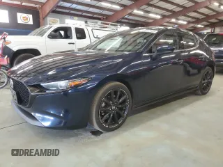 2019 Mazda Mazda3 Hatchback w/Premium Pkg with VIN JM1BPBNM1K1143984, listed as a Copart auction lot 88112455 with 130,558 mi miles and Clean Title. Bid and sale history available at carsss.com. Image 1.