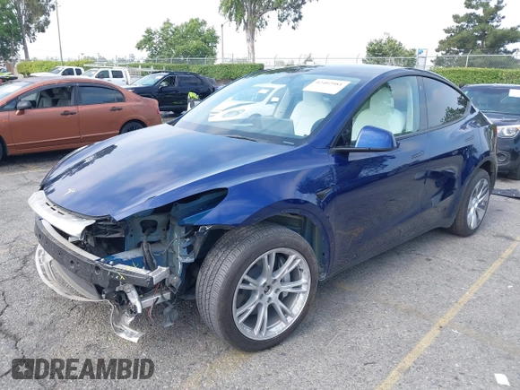 2023 Tesla Model Y Long Range z VIN 7SAYGDEE5PA102285, wystawiony jako IAAI lot #42402981 z przebiegiem 24 550 mil mil oraz . Historia ofert i sprzedaży dostępna na DreamBid. Obrazek 20.