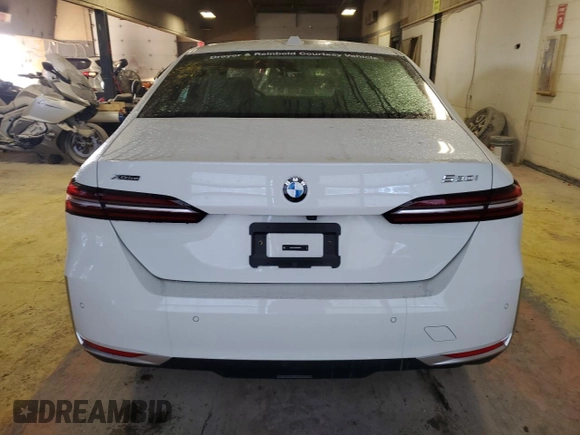 2024 BMW 5 Series 530i xDrive with VIN WBA53FJ02RCR63733, listed as a Copart auction lot 41767235 with Not provided miles and Clean title. Bid and sale history available at DreamBid. Image 6.