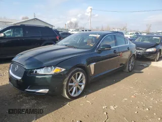 2015 Jaguar XF V6 Portfolio with VIN SAJWJ0FF2F8U53521, listed as a Copart auction lot 85555784 with 100,969 mi miles and Salvage Title. Bid and sale history available at carsss.com. Image 1.