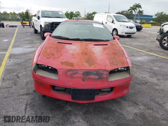 1995 Chevrolet Camaro z VIN 2G1FP22S2S2160911, wystawiony jako IAAI lot #42413545 z przebiegiem 32 767 mil mil oraz . Historia ofert i sprzedaży dostępna na DreamBid. Obrazek 6.