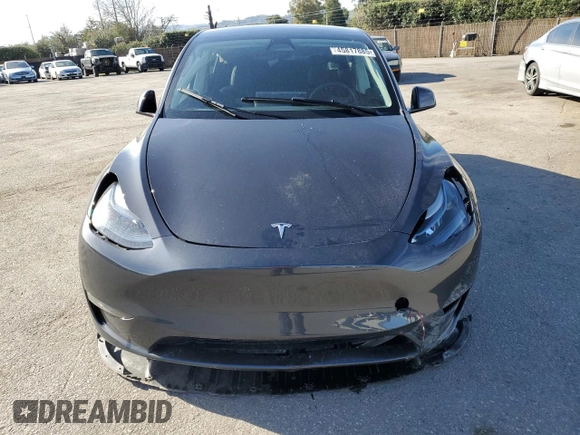 2025 Tesla Model Y Long Range with VIN 7SAYGDEE4SF272942, listed as a Copart auction lot 45817885 with 2,308 mi miles and Salvage Title. Bid and sale history available at DreamBid. Image 5.