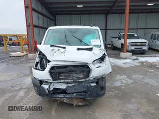 2020 Ford Transit Cargo with VIN 1FTBR1Y84LKB05972, listed as a IAAI auction lot 41496329 with Not Provided miles and . Bid and sale history available at DreamBid. Image 13.