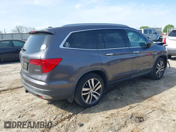2017 Honda Pilot Touring with VIN 5FNYF5H9XHB046479, listed as a IAAI auction lot 41941449 with 162,554 mi miles. Bid and sale history available at carsss.com. Image 4.