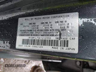 2014 Mazda 3 i Touring z VIN JM1BM1L70E1212930, wystawiony jako IAAI lot #42434348 z przebiegiem 107 209 mil mil oraz . Historia ofert i sprzedaży dostępna na DreamBid. Obrazek 9.