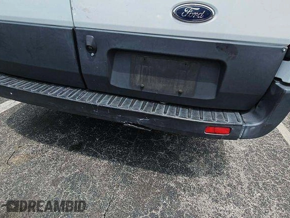 2018 Ford Transit with VIN 1FTYR1ZMXJKB47999, listed as a IAAI auction lot 42787302 with 140,957 mi miles and . Bid and sale history available at DreamBid. Image 5.