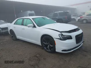2021 Chrysler 300 with VIN 2C3CCABGXMH549778, listed as a IAAI auction lot 41082103 with 87,952 mi miles. Bid and sale history available at carsss.com. Image 1.