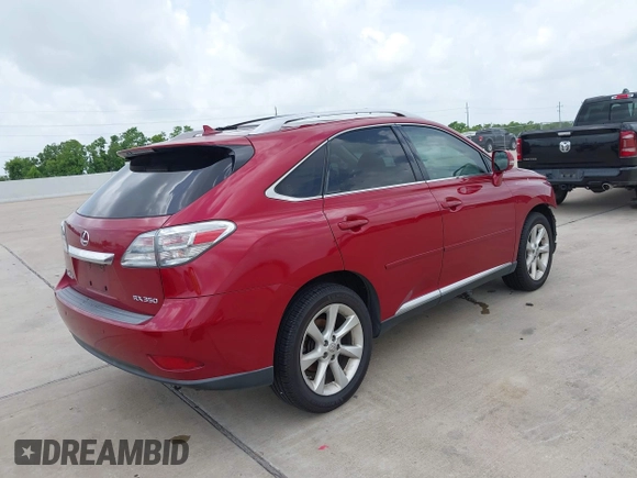2010 Lexus RX 350 z VIN JTJZK1BAXA2408960, wystawiony jako IAAI lot #42624601 z przebiegiem 167 468 mil mil oraz . Historia ofert i sprzedaży dostępna na DreamBid. Obrazek 4.