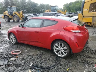 2013 Hyundai Veloster w/Gray Int z VIN KMHTC6AD0DU147454, wystawiony jako Copart lot #57814285 z przebiegiem 91 000 mil mil oraz Szkoda całkowita • Salvage title. Historia ofert i sprzedaży dostępna na DreamBid. Obrazek 2.