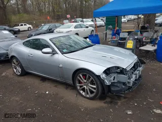 2008 Jaguar XK with VIN SAJWA43C889B21570, listed as a IAAI auction lot 42082547 with 99,783 mi miles. Bid and sale history available at carsss.com. Image 13.