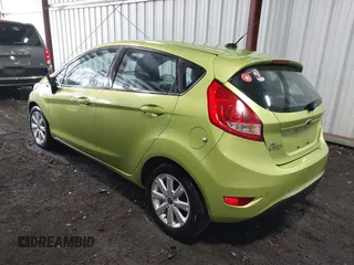 2013 Ford Fiesta SE with VIN 3FADP4EJ6DM150399, listed as a IAAI auction lot 41734742 with 139,056 mi miles. Bid and sale history available at carsss.com. Image 3.