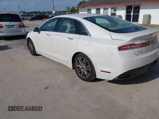 2014 Lincoln MKZ z VIN 3LN6L2G9XER812698, wystawiony jako IAAI lot #42112325 z przebiegiem 144 227 mil mil oraz . Historia ofert i sprzedaży dostępna na DreamBid. Obrazek 3.