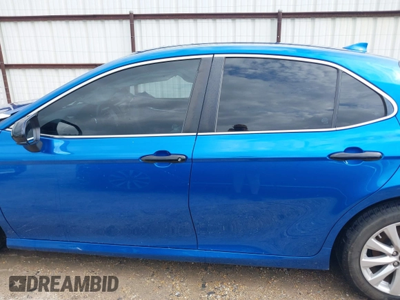 2019 Toyota Camry LE with VIN 4T1B11HK7KU259920, listed as a IAAI auction lot 42115493 with 69,254 mi miles and . Bid and sale history available at DreamBid. Image 14.