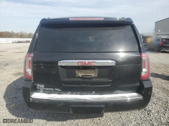 2020 GMC Yukon XL Denali with VIN 1GKS1HKJ0LR182572, listed as a Copart auction lot 80741994 with 107,195 mi miles and Salvage Title. Bid and sale history available at carsss.com. Image 6.