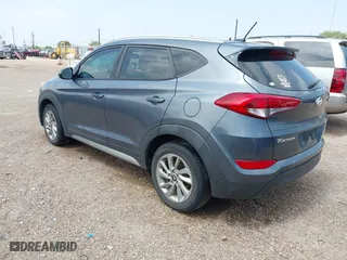2017 Hyundai Tucson SE Plus with VIN KM8J33A42HU375273, listed as a IAAI auction lot 41900474 with 124,658 mi miles. Bid and sale history available at carsss.com. Image 3.