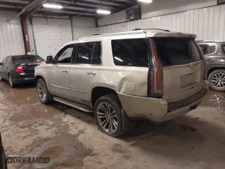 2017 Cadillac Escalade Premium Luxury with VIN 1GYS4CKJ9HR390988, listed as a IAAI auction lot 41626132 with 166,185 mi miles. Bid and sale history available at carsss.com. Image 3.