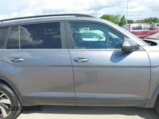 2024 Volkswagen Atlas SE z VIN 1V2HR2CA8RC563655, wystawiony jako IAAI lot #42586812 z przebiegiem 36 426 mil mil oraz . Historia ofert i sprzedaży dostępna na DreamBid. Obrazek 13.