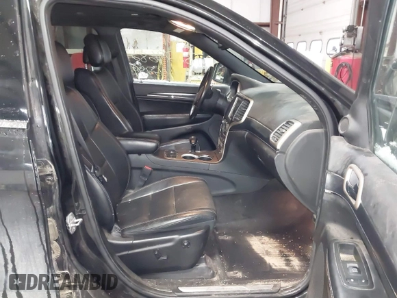 2014 Jeep Grand Cherokee Limited with VIN 1C4RJFBT1EC156536, listed as a IAAI auction lot 41053655 with 204,008 mi miles and . Bid and sale history available at DreamBid. Image 5.
