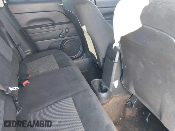 2014 Jeep Patriot Sport with VIN 1C4NJPBB2ED915782, listed as a IAAI auction lot 41628774 with 144,588 mi miles. Bid and sale history available at carsss.com. Image 8.