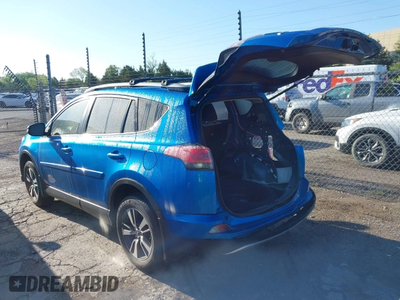 2018 Toyota RAV4 XLE with VIN JTMWFREV1JJ736877, listed as a IAAI auction lot 42072222 with 43,004 mi miles and . Bid and sale history available at carsss.com. Image 3.