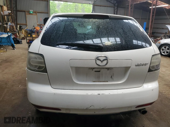 2012 Mazda CX-7 i Sport z VIN JM3ER2B56C0422222, wystawiony jako Copart lot #55294495 z przebiegiem 318 415 mil mil oraz Tytuł czysty. Historia ofert i sprzedaży dostępna na DreamBid. Obrazek 6.