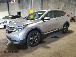 2018 Honda CR-V Touring with VIN 7FARW2H95JE012947, listed as a Copart auction lot 64779925 with 20,561 mi miles and Salvage title. Bid and sale history available at DreamBid. Image 1.