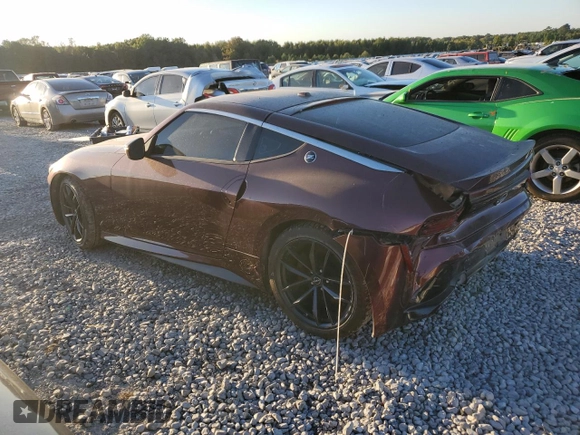 2023 Nissan Z Performance z VIN JN1BZ4BH8PM311058, wystawiony jako Copart lot #74943134 z przebiegiem 26 419 mil mil oraz Czysty tytuł • Clean title. Historia ofert i sprzedaży dostępna na DreamBid. Obrazek 2.