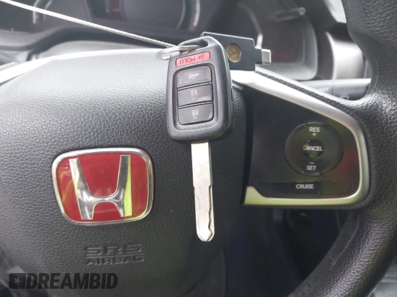2017 Honda Civic LX with VIN 19XFC2F53HE217867, listed as a IAAI auction lot 42296194 with 104,670 mi miles and . Bid and sale history available at DreamBid. Image 11.