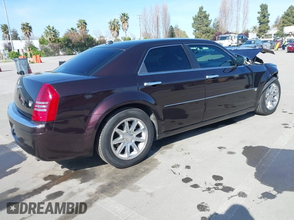 2005 Chrysler 300 with VIN 2C3JA63H25H102333, listed as a IAAI auction lot 41967876 with 125,092 mi miles. Bid and sale history available at carsss.com. Image 4.