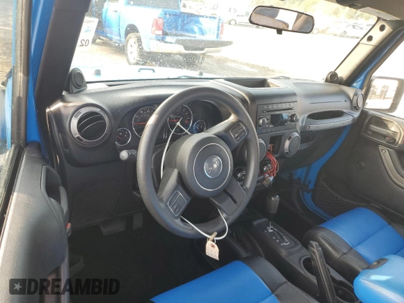 2012 Jeep Wrangler Sport with VIN 1C4AJWAG3CL144015, listed as a Copart auction lot 50969705 with 93,417 mi miles and Salvage title. Bid and sale history available at DreamBid. Image 8.