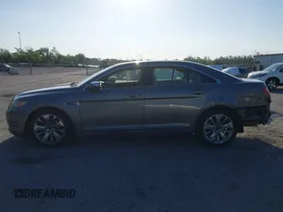 2011 Ford Taurus Limited with VIN 1FAHP2FW3BG117688, listed as a IAAI auction lot 41974469 with 215,036 mi miles and . Bid and sale history available at carsss.com. Image 15.