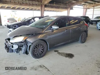 2014 Ford Focus Titanium z VIN 1FADP3N29EL382646, wystawiony jako Copart lot #60757385 z przebiegiem 123 447 mil mil oraz Nie do naprawy • Non repairable. Historia ofert i sprzedaży dostępna na DreamBid. Obrazek 1.