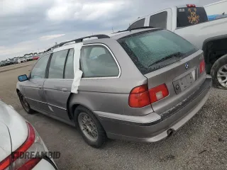 2000 BMW 5 Series 528iAt with VIN WBADP6345YBV63945, listed as a Copart auction lot 76298424 with 0 mi miles and Salvage Title. Bid and sale history available at carsss.com. Image 2.