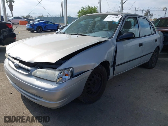 2000 Toyota Corolla VE with VIN 1NXBR12E6YZ393077, listed as a IAAI auction lot 42111914 with 181,056 mi miles and . Bid and sale history available at DreamBid. Image 22.