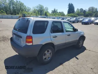 2005 Ford Escape XLS Value with VIN 1FMYU92Z55KC93604, listed as a Copart auction lot 60104145 with 86,788 mi miles and Salvage title. Bid and sale history available at DreamBid. Image 3.