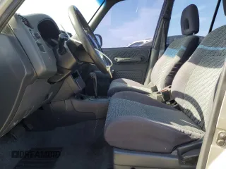 2000 Toyota RAV4 with VIN JT3GP10V2Y0052306, listed as a Copart auction lot 54726325 with 244,910 mi miles and Salvage title. Bid and sale history available at DreamBid. Image 7.