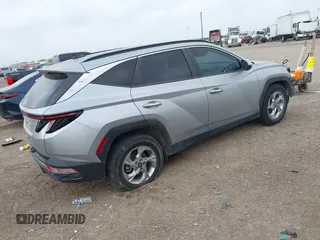 2022 Hyundai Tucson SEL with VIN 5NMJB3AE9NH139738, listed as a IAAI auction lot 41948244 with 31,990 mi miles and . Bid and sale history available at DreamBid. Image 4.