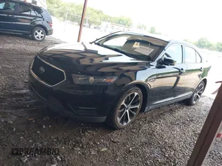 2016 Ford Taurus SHO z VIN 1FAHP2KT4GG140903, wystawiony jako IAAI lot #42415173 z przebiegiem 141 392 mil mil oraz . Historia ofert i sprzedaży dostępna na DreamBid. Obrazek 2.