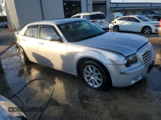 2010 Chrysler 300 with VIN 2C3CA2CV1AH279697, listed as a Copart auction lot 80999824 with 0 mi miles and Salvage Title. Bid and sale history available at carsss.com. Image 4.