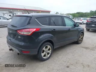 2013 Ford Escape SE with VIN 1FMCU9G91DUA07169, listed as a IAAI auction lot 42602370 with 153,001 mi miles and . Bid and sale history available at DreamBid. Image 4.