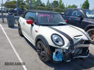 2021 MINI Convertible with VIN WMWWJ9C0XM3M07302, listed as a IAAI auction lot 42027854 with 30,921 mi miles and . Bid and sale history available at DreamBid. Image 1.