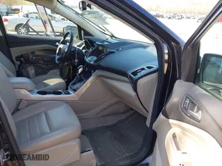 2013 Ford Escape SEL with VIN 1FMCU0H9XDUC42566, listed as a IAAI auction lot 42087717 with 233,091 mi miles. Bid and sale history available at carsss.com. Image 5.