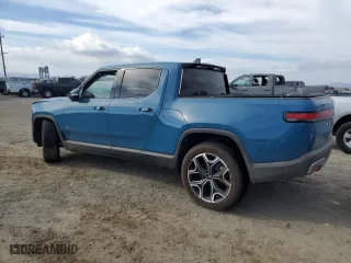 2024 Rivian R1T Adventure with VIN 7FCTGBAA9RN031298, listed as a Copart auction lot 71777774 with 0 mi miles and Salvage Title. Bid and sale history available at carsss.com. Image 2.